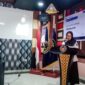Kepala seksi Tekhnologi Informasi dan keimigrasian, Hijrana Rahim, saat menyampaikan laporan pelaksanaan sosialisasi  